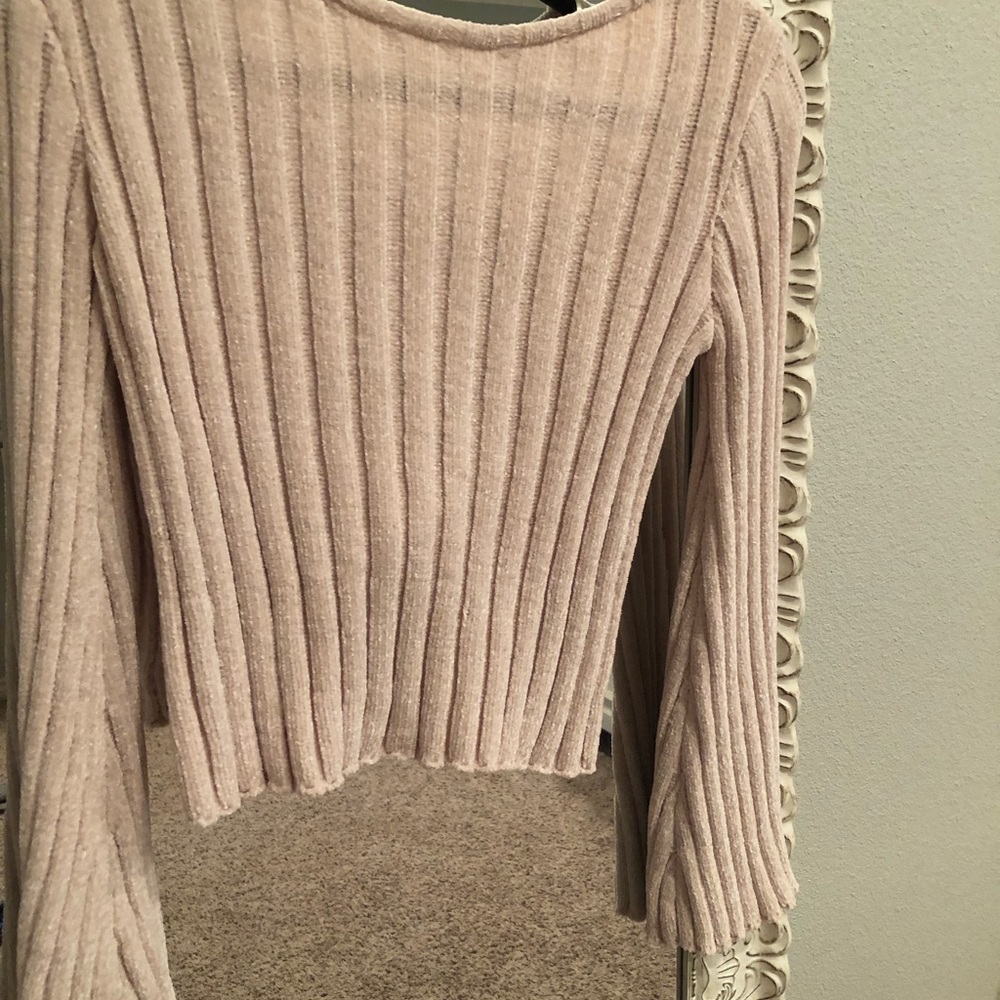 Boutique cropped sweater with open back